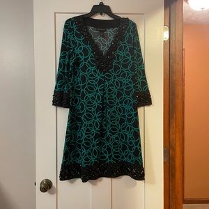 Geometric print + beadwork. Great dress for so many occasions!